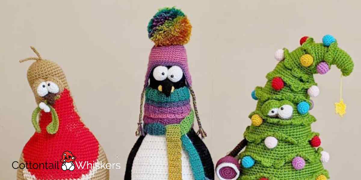 A crochet christmas Robin with mistletoe. A crocheted penguin in a mutli coloured scarf and hat alongside a lopsided decorated crocheted christmas tree created from an original design by Cottontail & Whiskers.