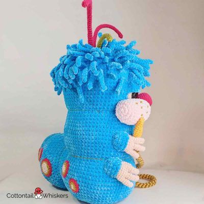 Amigurumi blue crochet caterpillar side angle. Pattern by cottontail and whiskers