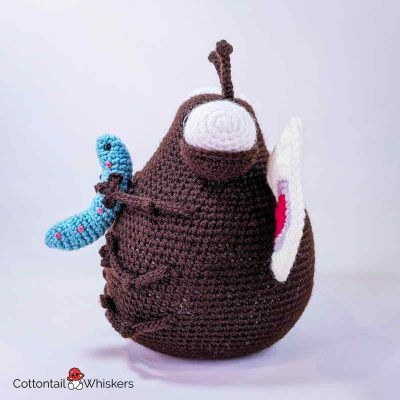 Butterfly crochet doorstop pattern with amigurumi baby caterpillar by cottontail and whiskers