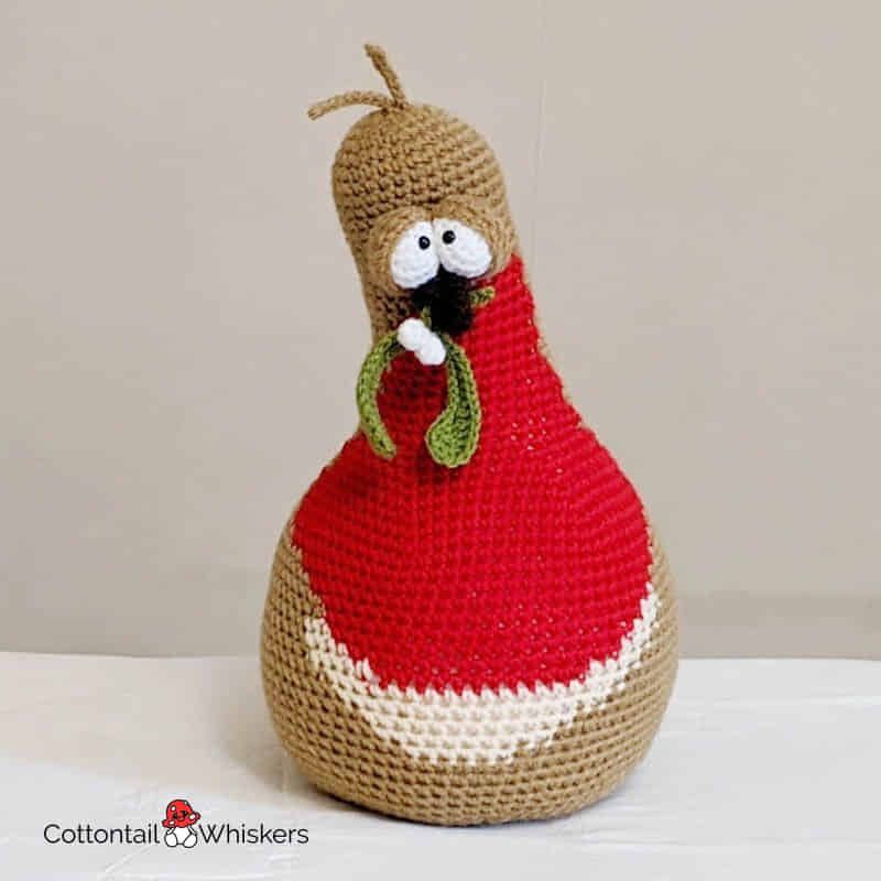 Christmas crochet robin amigurumi doorstop pattern by cottontail and whiskers