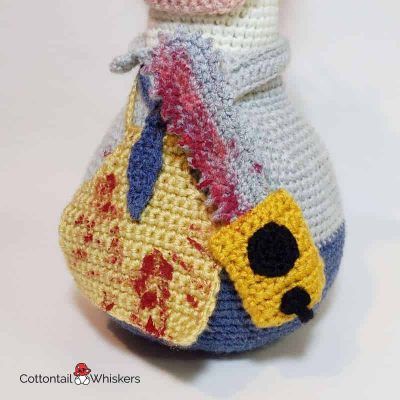 Halloween amigurumi leatherface crocheted door stopper pattern by cottontail and whiskers